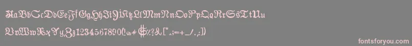 フォントAuldmagickBold – 灰色の背景にピンクのフォント