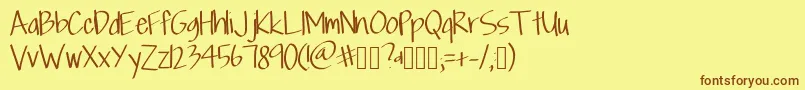 Fonte Scriptfont – fontes marrons em um fundo amarelo