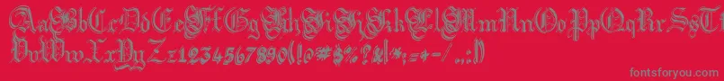 ArgorFlahmScaqh-Schriftart – Graue Schriften auf rotem Hintergrund