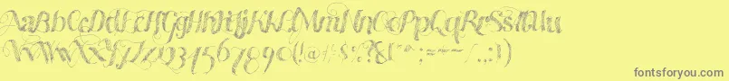 フォントMadewithb – 黄色の背景に灰色の文字
