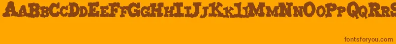 MonstruoJedagraphicx Font – Brown Fonts on Orange Background