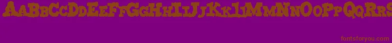 MonstruoJedagraphicx Font – Brown Fonts on Purple Background