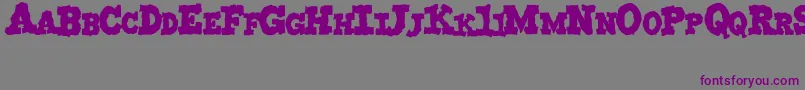 MonstruoJedagraphicx Font – Purple Fonts on Gray Background