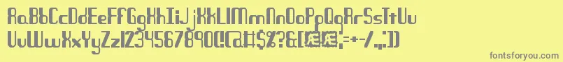 QuandaryBrk-fontti – harmaat kirjasimet keltaisella taustalla