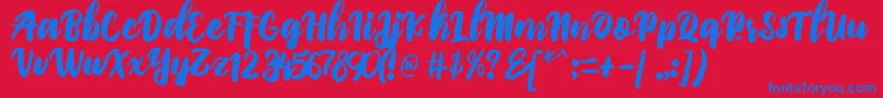 PriscilliaScript-Schriftart – Blaue Schriften auf rotem Hintergrund