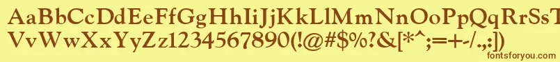 IndiraK Font – Brown Fonts on Yellow Background