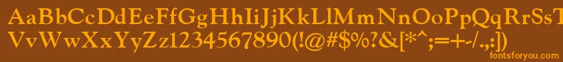 IndiraK Font – Orange Fonts on Brown Background