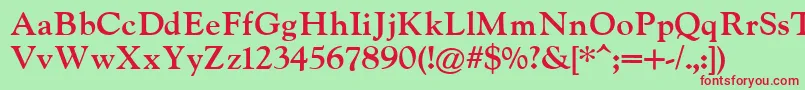 IndiraK Font – Red Fonts on Green Background