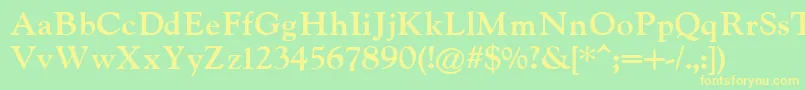 IndiraK Font – Yellow Fonts on Green Background