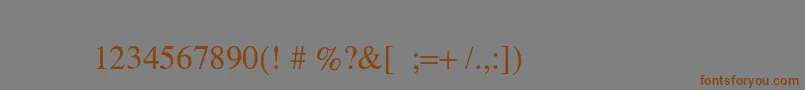 フォントSymbolo – 茶色の文字が灰色の背景にあります。