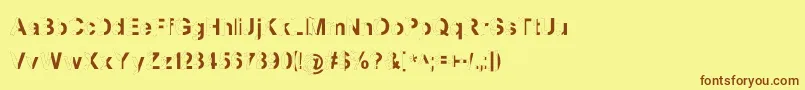 フォントMashySchizoid – 茶色の文字が黄色の背景にあります。