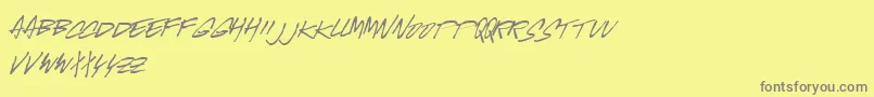 フォントMcgus – 黄色の背景に灰色の文字