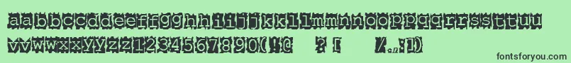フォントPapercut – 緑の背景に黒い文字