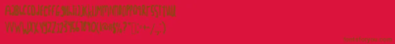 Tightscript Font – Brown Fonts on Red Background