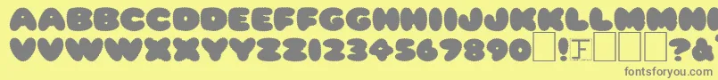 Ripple0-fontti – harmaat kirjasimet keltaisella taustalla