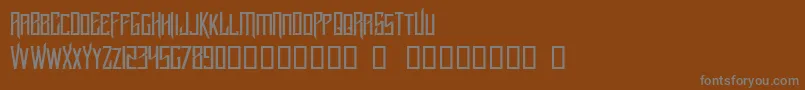 フォントLucker – 茶色の背景に灰色の文字