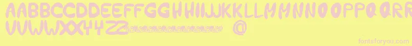 HolidayEarlierFontBySetitikasa Font – Pink Fonts on Yellow Background