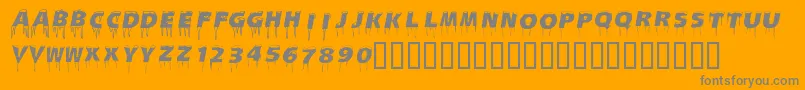 Icecaps-fontti – harmaat kirjasimet oranssilla taustalla