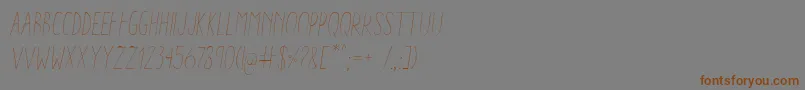 AracneCondensedLightItalic Font – Brown Fonts on Gray Background