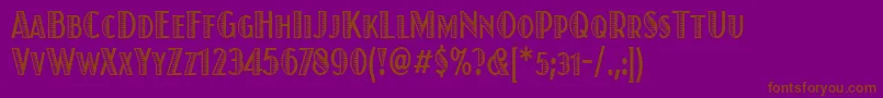 Czcionka JuanitaxiloitccdTt – brązowe czcionki na fioletowym tle
