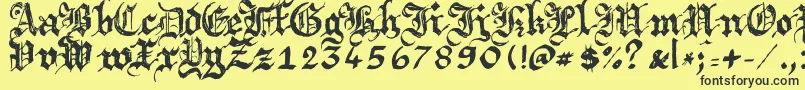 Argbrujs-Schriftart – Schwarze Schriften auf gelbem Hintergrund