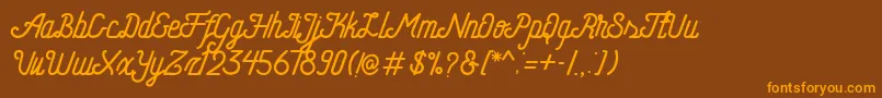 Шрифт HometownFreeScript – оранжевые шрифты на коричневом фоне