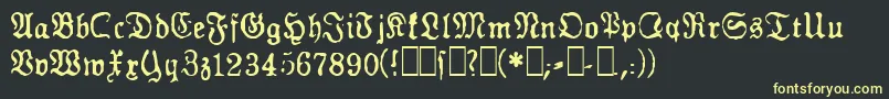 フォントGesetz – 黒い背景に黄色の文字