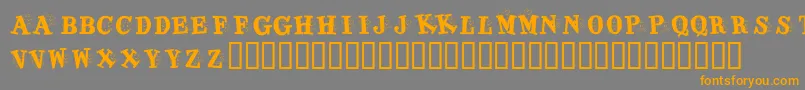 KrJigsawJoey-Schriftart – Orangefarbene Schriften auf grauem Hintergrund