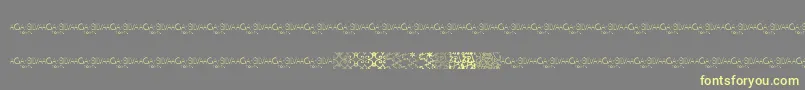 MayaTilesPromo-Schriftart – Gelbe Schriften auf grauem Hintergrund