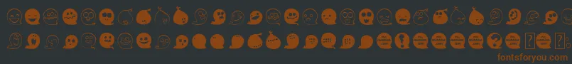 Fonte FluffyGhostDing – fontes marrons em um fundo preto