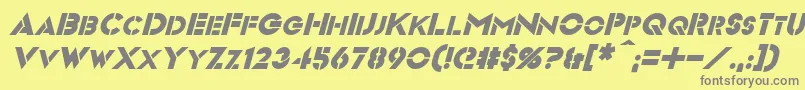 フォントVideopacItalic – 黄色の背景に灰色の文字