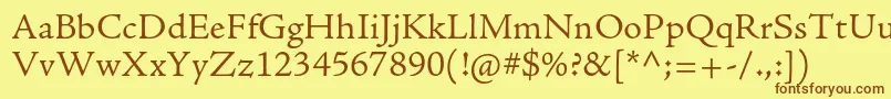 フォントAjensonproLtcapt – 茶色の文字が黄色の背景にあります。