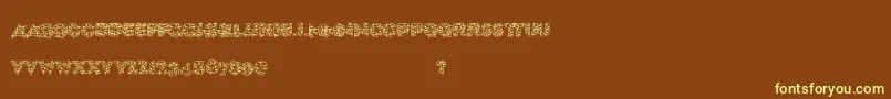 Xmaslite-Schriftart – Gelbe Schriften auf braunem Hintergrund