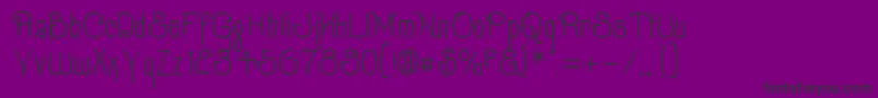 Quixot-fontti – mustat fontit violetilla taustalla