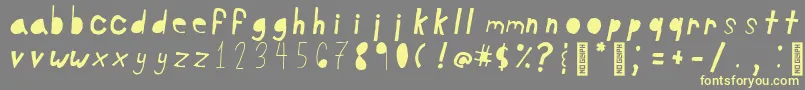 June5Regular Font – Yellow Fonts on Gray Background