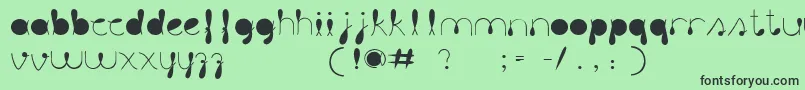Шрифт LiquitColour – чёрные шрифты на зелёном фоне