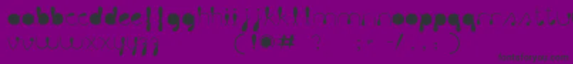フォントLiquitColour – 紫の背景に黒い文字