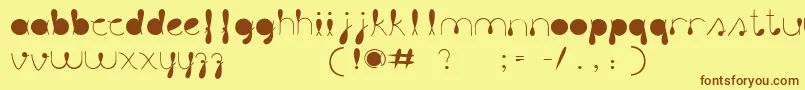 Шрифт LiquitColour – коричневые шрифты на жёлтом фоне
