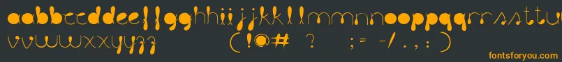 フォントLiquitColour – 黒い背景にオレンジの文字