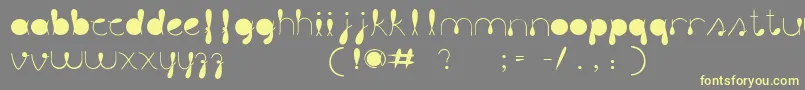 LiquitColour-fontti – keltaiset fontit harmaalla taustalla
