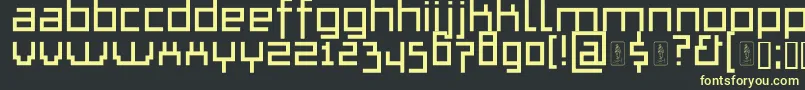 フォントThapkieMg – 黒い背景に黄色の文字