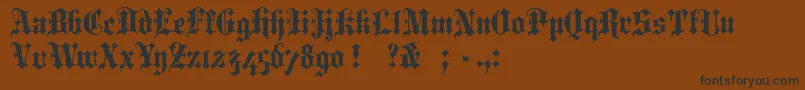 PortcullionBold-Schriftart – Schwarze Schriften auf braunem Hintergrund