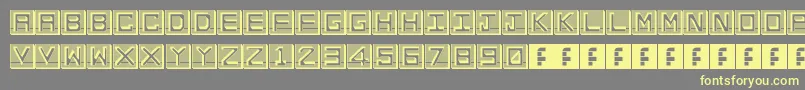 EnHollowTiles Font – Yellow Fonts on Gray Background