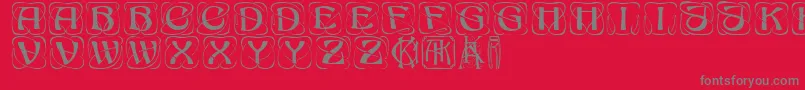 KonanurRegular-Schriftart – Graue Schriften auf rotem Hintergrund