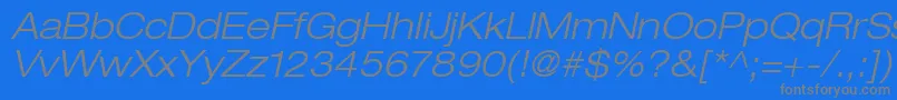 フォントHelveticaLt43LightExtendedOblique – 青い背景に灰色の文字