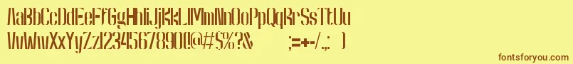 フォントKongRegular – 茶色の文字が黄色の背景にあります。