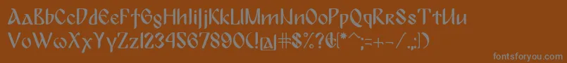BulgariaModernaPro-fontti – harmaat kirjasimet ruskealla taustalla