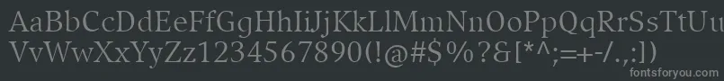 フォントCompatilExquisitLtComRegular – 黒い背景に灰色の文字