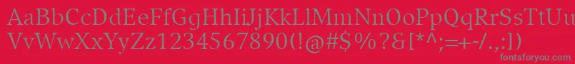 Czcionka CompatilExquisitLtComRegular – szare czcionki na czerwonym tle
