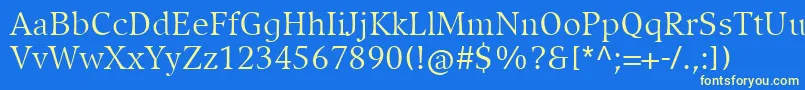 CompatilExquisitLtComRegular Font – Yellow Fonts on Blue Background